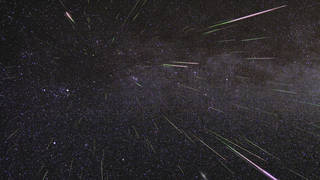 An outburst of Perseid meteors lights up the sky in August 2009 in this time-lapse image. Stargazers expect a similar outburst during next week’s Perseid meteor shower, which will be visible overnight on Aug. 11 and 12.jpg